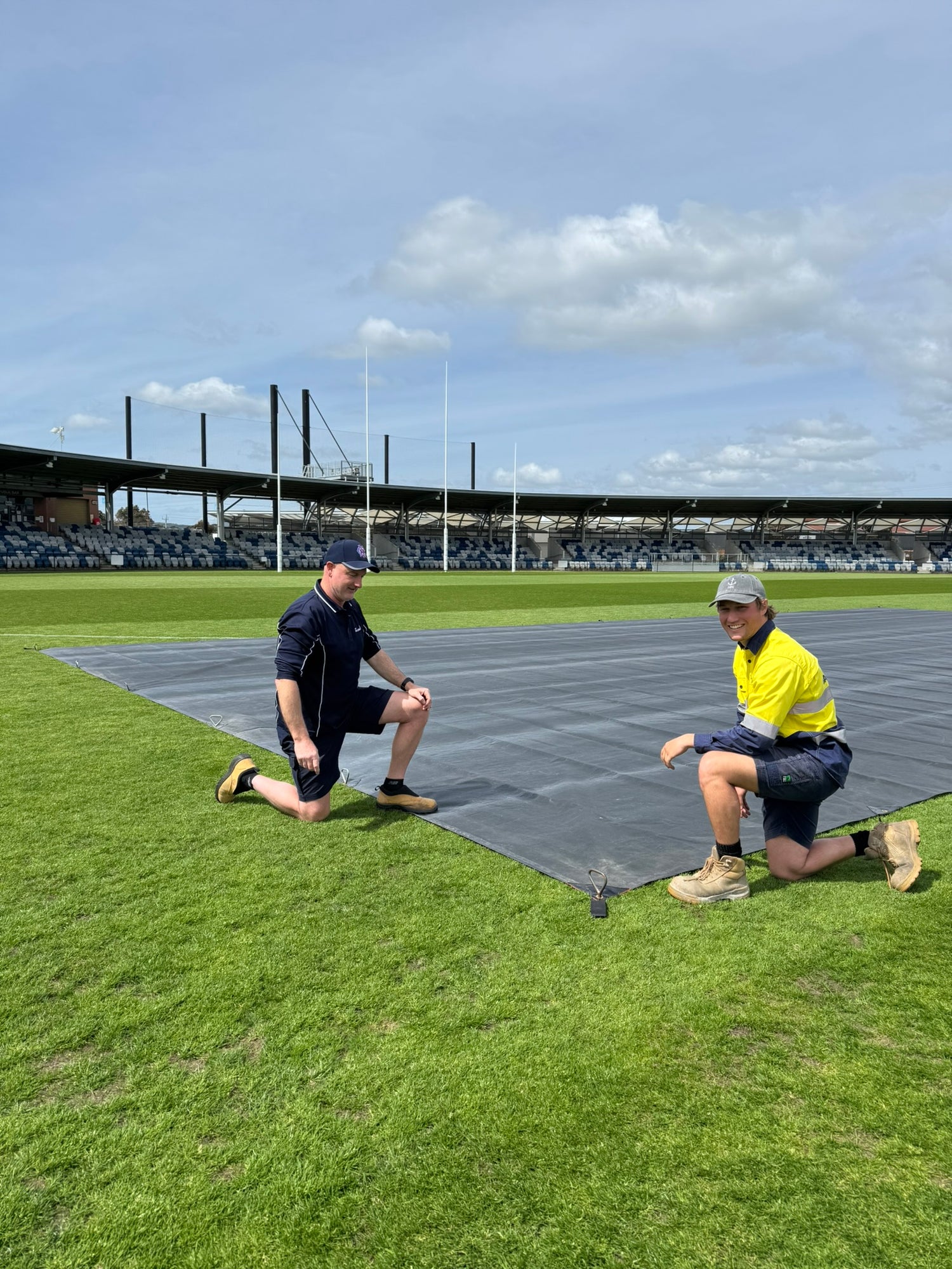 growth blanket trial installed on sports turf at Mars Stadium Ballarat
sports turf repair growth cover positioned across Mars Stadium playing surface
turf blanket supporting couch grass recovery during Mars Stadium trial
large format growth cover deployed on AFL oval turf in Ballarat
professional turf growth blanket trial on Mars Stadium grass surface
warm season sports turf repair using growth cover at Mars Stadium Ballarat